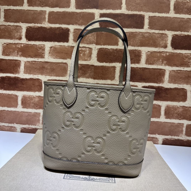 G*u*i shopping bags